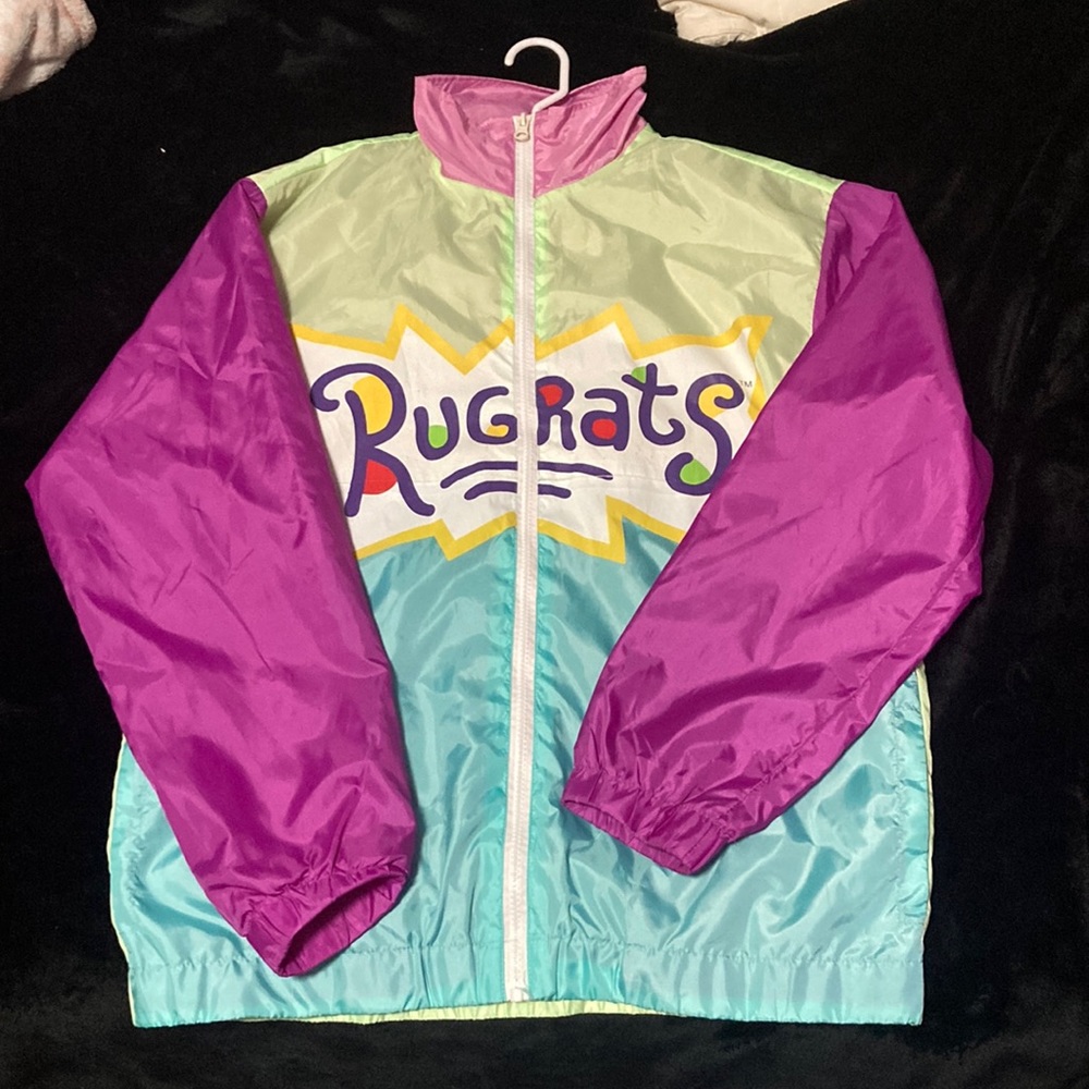 Size Medium women’s rugrats wind breaker colors purple and light green